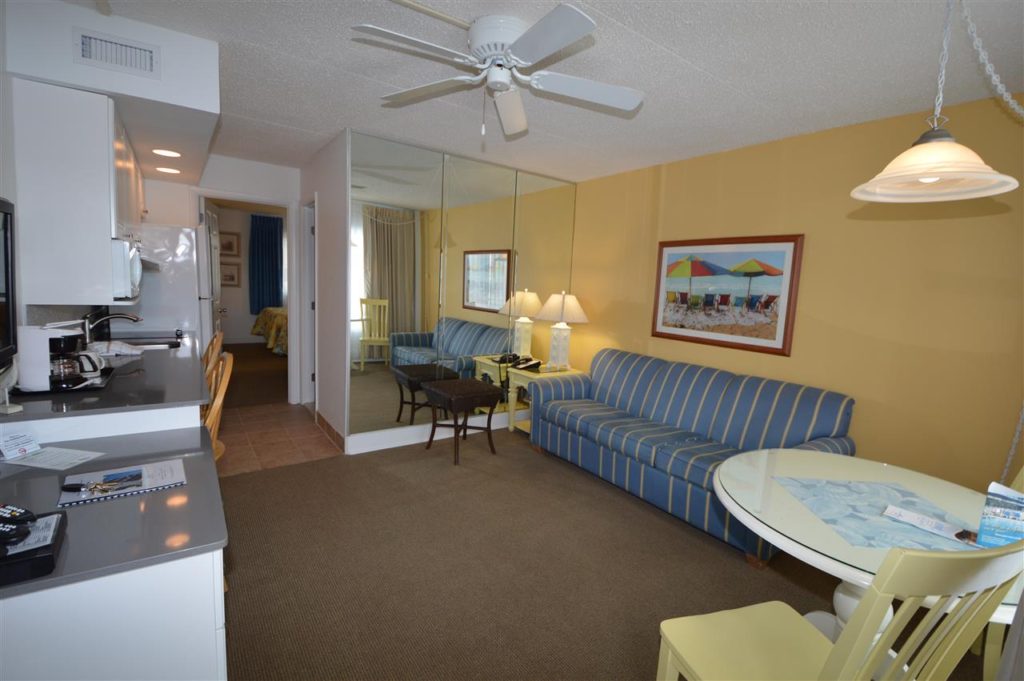 Concord Suites 490 square feet with living room and kitchenette with a bath and bedroom in the back