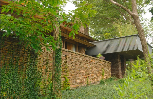 The Buckley House, designed by E. Fay Jones, is a midcentury modern with all the requisite large windows and light.